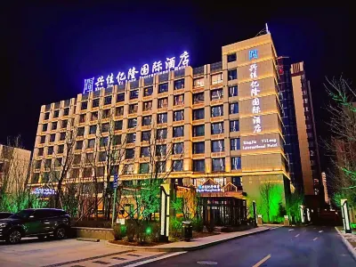 Xingjia Yilong Hotel Hoteles cerca de Estación de Tren Meihekou