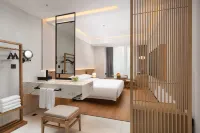 Seclusion Design Hotel (Jiujiang Railway Station wanda plaza Store) Hotel berhampiran Jiujiang Chengxi Harbor Container Wharf