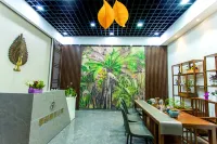 Jizhu Holiday Apartment (Menghai Mengbala Store) Hotels near Guangmang Mountain