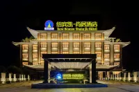 New Beacon Shangju Hotel (Yingshan Tourist Center Chaxiang Small Town) Hotel berhampiran Zhaoguan