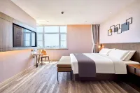 Home Inn Collection (Tangshan Caofeidian Industrial Zone Branch) Отели рядом с достопримечательностью «Школы профессиональных технологий Цуй-Дэн»