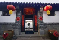 Shengyuan Boutique Homestay (Yantai Wanda Suocheng Branch) Hotels near She's