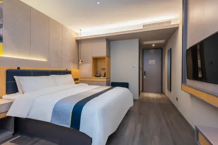 Home Business Travel Hotel (QingdaoWusi Plaza, Wanxiang City, )