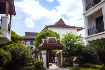 Jizhu Holiday Apartment (Menghai Mengbala Store) Hotels near Guangmang Mountain