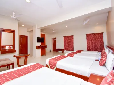 Pleasant Inn Hotels near Chinna Manikoondu