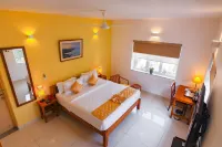 Hotel Aura by Woco Stays Hotels near Chinna Manikoondu