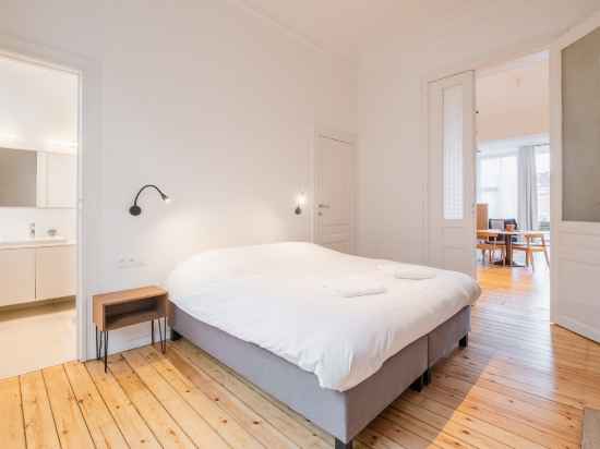 FrançaisAppartement de 80 m² avec check-in automatique Rooms