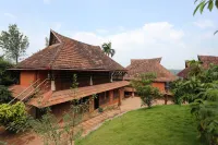 Thejas Resorts Wayanad Hotels near Pazhery Ground