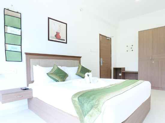 Collection O Hotel Rishi Gardens Rooms