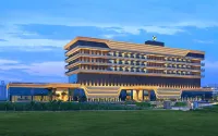 Gift City Club, a Member of Radisson Individuals Hotels near Mahudi Jain Temple