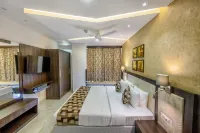 Essentia Manipal Inn Hotels near "Geetha Mandira"