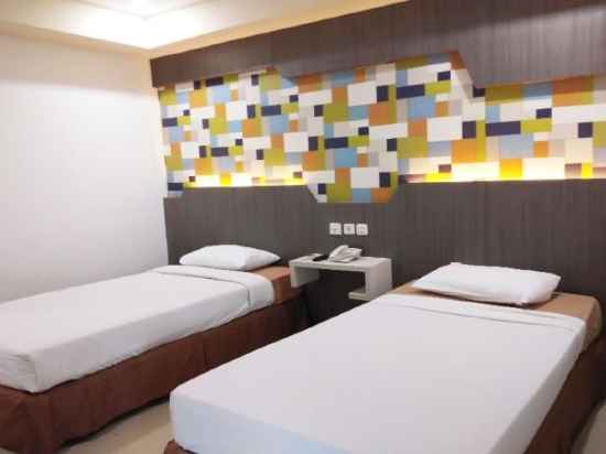 Grand Hotel Jambi Rooms