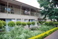 Purple Olive Guest House Hotels near Netcare Akasia Hospital