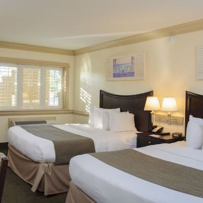 Standard 2 Queen Beds with Pool / Parking Lot View Shutters on The Banks Promo Code