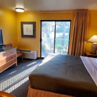 One King Executive (No Pets) Olympic View Inn Promo Code