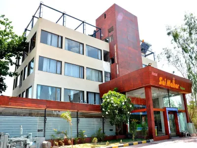 Hotel Malhar Palace Hotels near Garden, MPKV, Rahuri