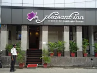 Pleasant Inn Hotels near Chinna Manikoondu