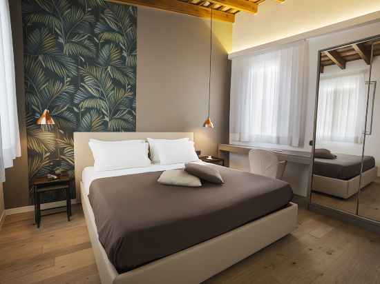 Badia Nuova Apart Hotel Rooms