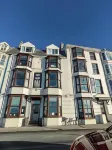 The Cardigan Bay Guest House Отели рядом с достопримечательностью «Кумиствайт Уотерфолл»