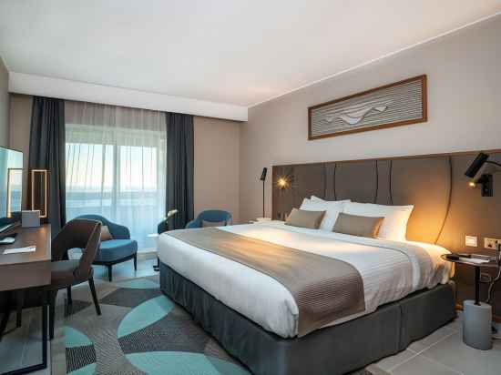 Hotel Holiday International Rooms