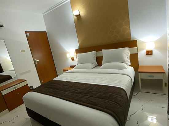 Utsavam Hotel Apartments Rooms