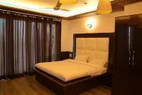 Bellevue Inn Hotel Restaurant & Resort Hotels near Ichapuran Shani Dham