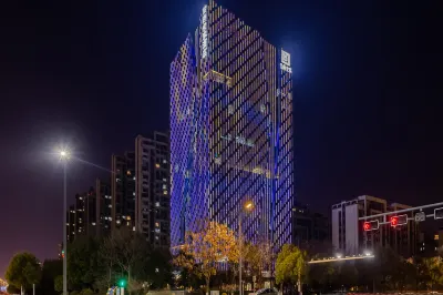 Earl Family Hotel (Fuyang Shuangqingwan Water Street) โรงแรมใกล้อาคารพาณิชย์ Fuyang