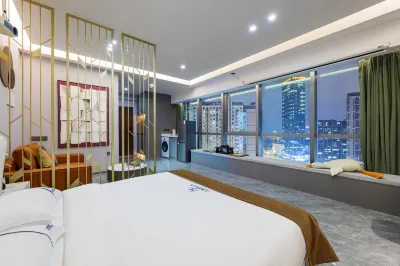 Wanlong International Apartment (Wanxiang City Branch, Zhanggong District) Hotels near Shuiguowu