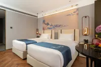 JIANGUO BOUTIQUE HOTEL TIANJIN EYE Отели рядом с достопримечательностью «Синьцзян Парк»