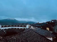 Tengchong Soul Recovery Fuxilou Inn (Yalya Lake Branch) Отели рядом с достопримечательностью «Город Циоло»