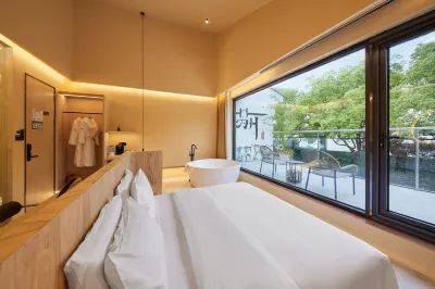 WOPAI Designer Hotel (Suzhou Guanqian Street Yangyuxiang Subway Station Branch) Hotels near Levi's