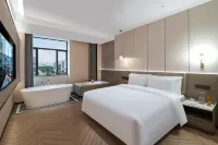 Meihao Lizhi Hotel (Guangzhou Huadu Cultural Tourism City Baiyun Airport) Отели рядом с достопримечательностью «Гуанбай-Син-Сити (Дрон-Журавль-Роуд)»