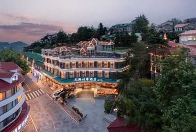 Lushan Tianhai Baitang Hotel(Guling Street Cableway Station Store) Отели рядом с достопримечательностью «Пейзажный район Цуйшань»