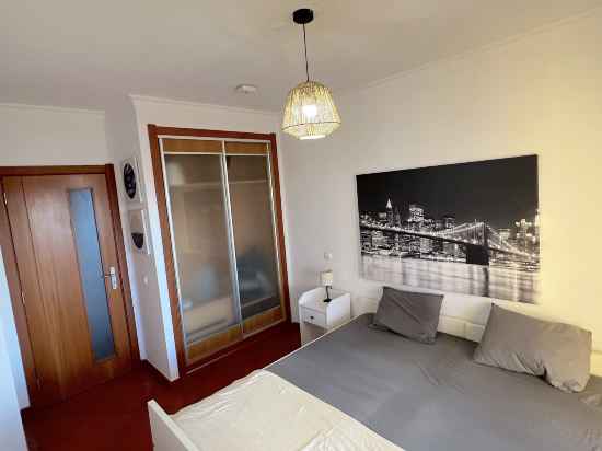 BnB Homes Apartment with cory Terrace & Swimming pool near the heart city Rooms