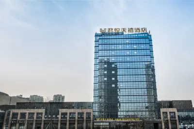 Junyue Wellwishing Hotel Hôtels à proximité de la Gare de Yixing