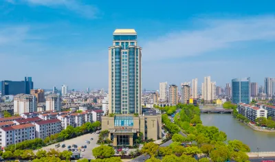 Dongyi International Hotel Hôtels à proximité de la Gare de Yixing