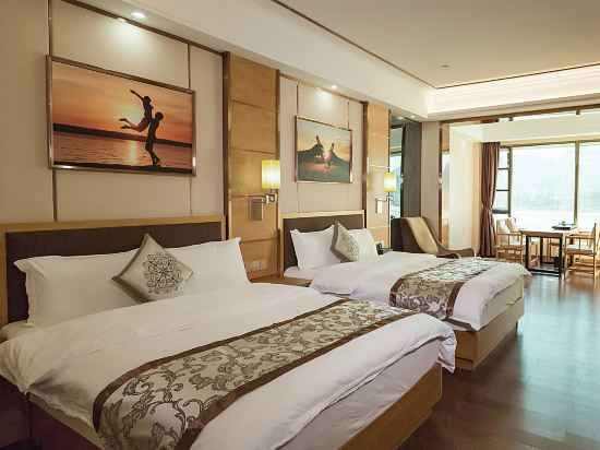 Qianbai Business Hotel Rooms