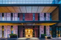 Yun He Ye Bo Hotel (Shanghai Pudong International Airport) Отели рядом с достопримечательностью «Пляж в Южном Хуэй-Син-Сити»