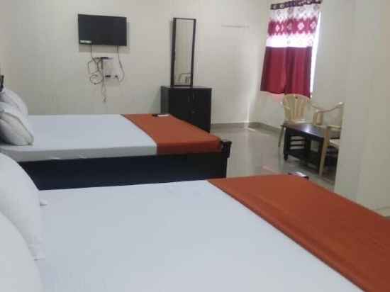 Iroomz Hotel Sri Kanya Residency Rooms