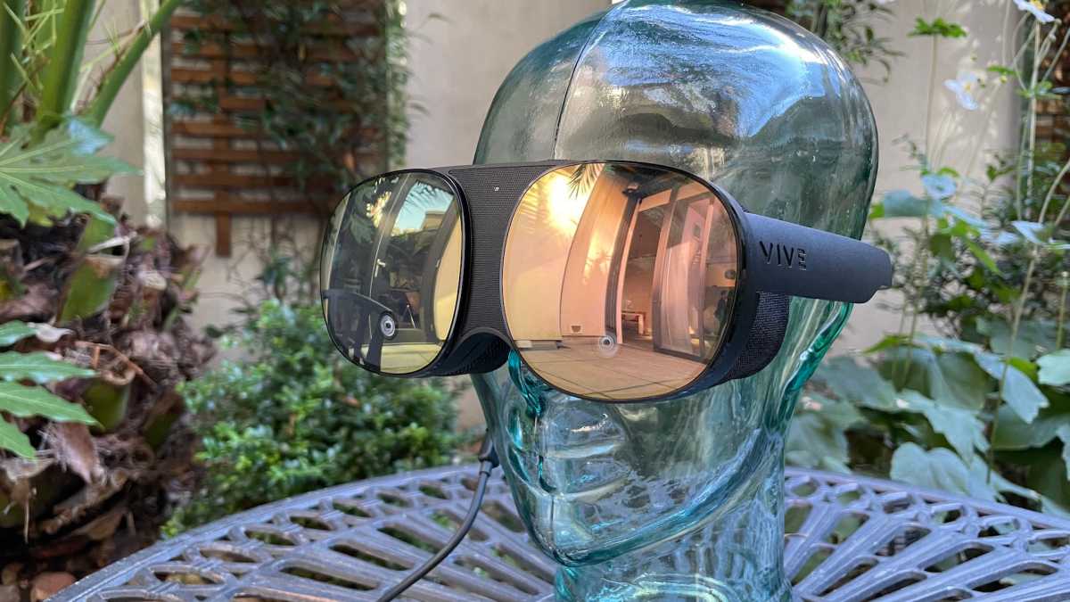 HTC Vive Flow on a glass head