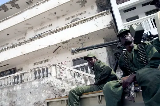 Somalian forces loyal to the TFG (Transition Federal Government) patrol the streets in Mogadishu