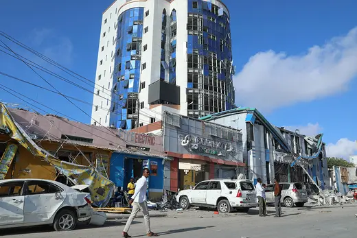 Damage outside the education ministry is seen after car bombings targeted the building..