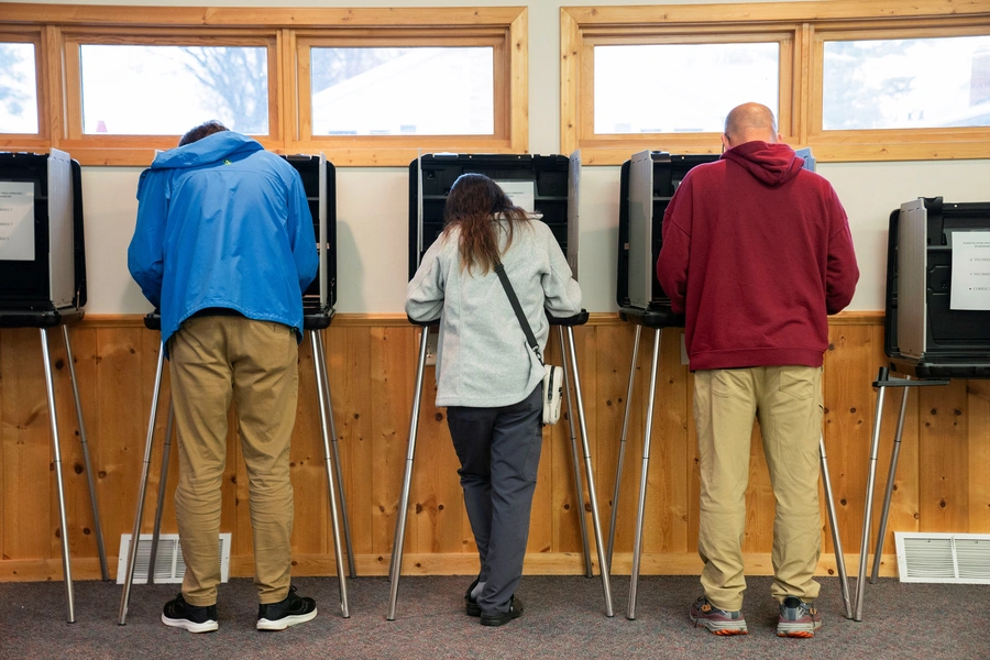 People vote in the U.S. presidential election on Election Day at Sawyer County's Hayward City Hall in Hayward, Wisconsin.