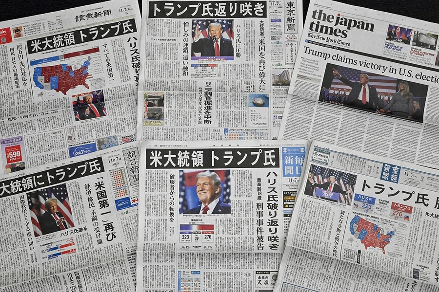 A selection of newspaper front pages in Tokyo with images of Donald Trump the day after his election victory on November 7, 2024.