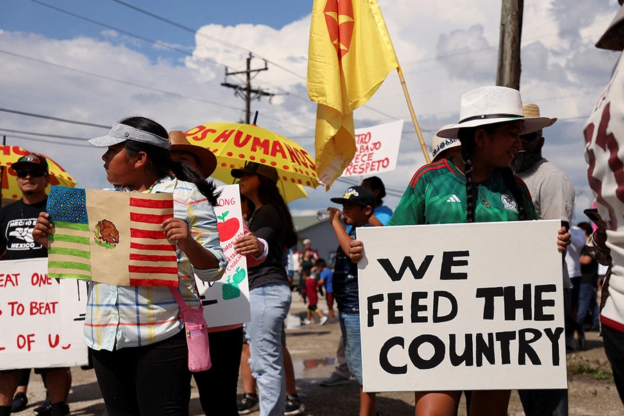 A group of immigrants attends a protest against an immigration bill in Immokalee, Florida, in 2023.