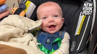 Heartwarming moment baby with hearing aid hears parents for the first time