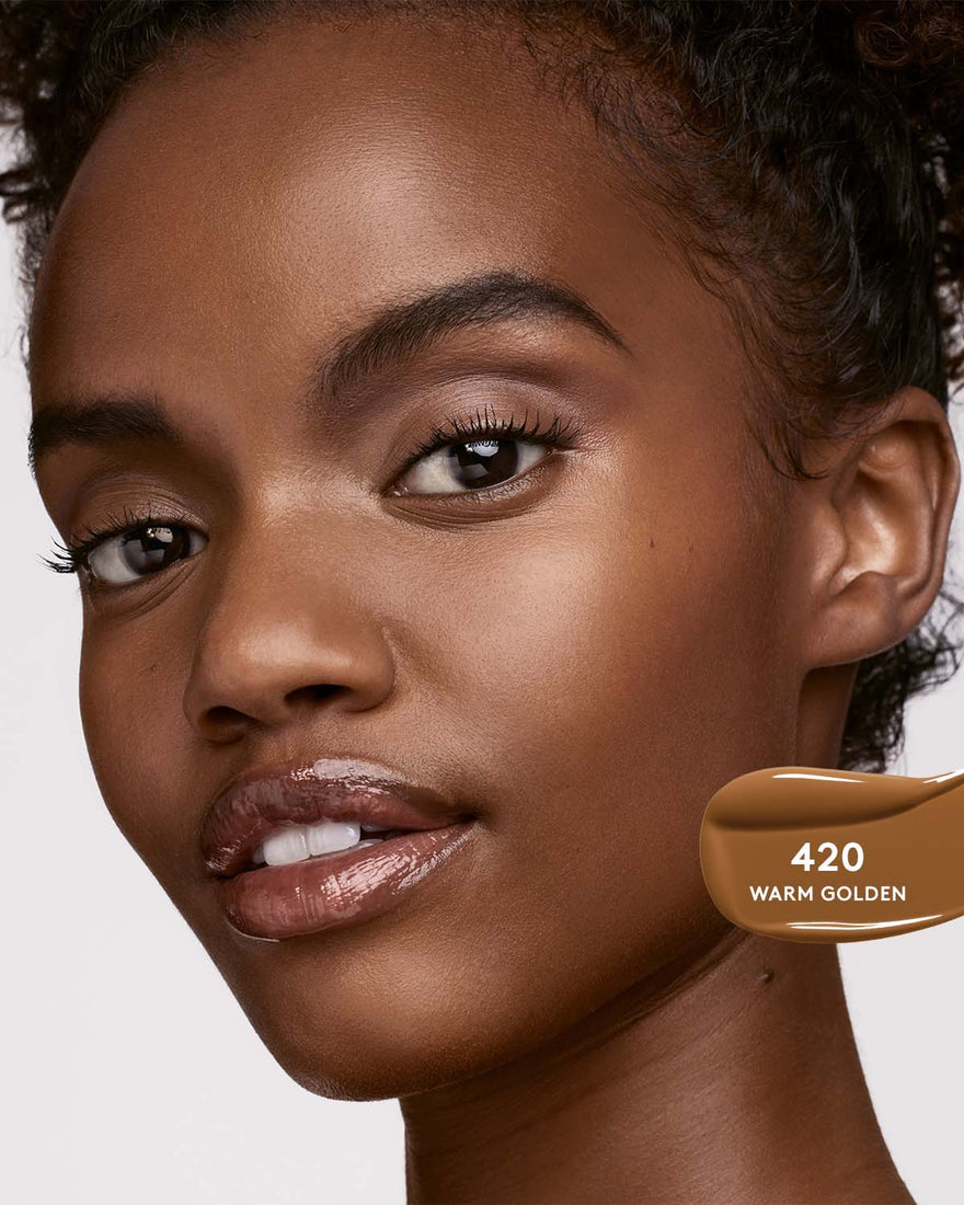 Model wearing shade 420 foundation