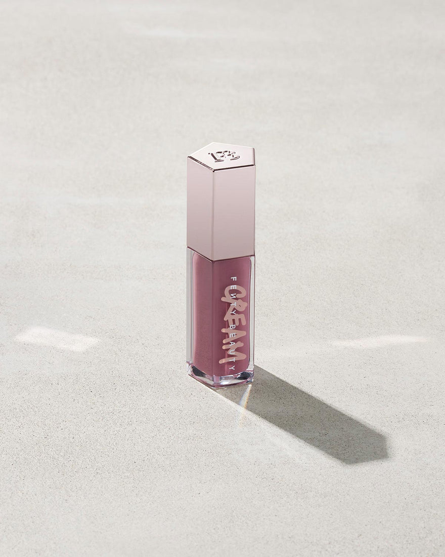 tube of Fenty Beauty Gloss Bomb Cream Color Drip Lip Cream lip gloss shown in shade Mauve Wive$