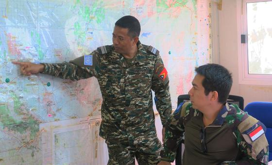 A peacekeeper from Timor-Leste (left) works alongside an Indonesian colleague at the UN peacekeeping mission in South Sudan.