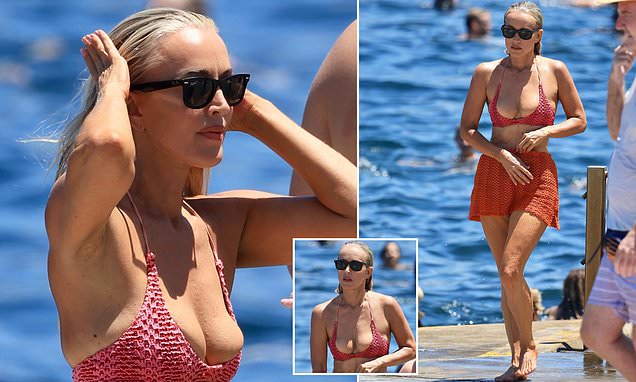 Jackie 'O' Henderson flaunts her slimmed down figure in fiery orange bikini ahead of her